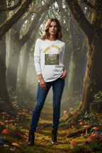 Woman wearing a white sweatshirt with a graphic design in a forest setting
