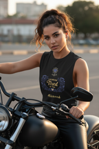 Woman sitting on a motorcycle wearing a black sleeveless shirt with text and graphics.